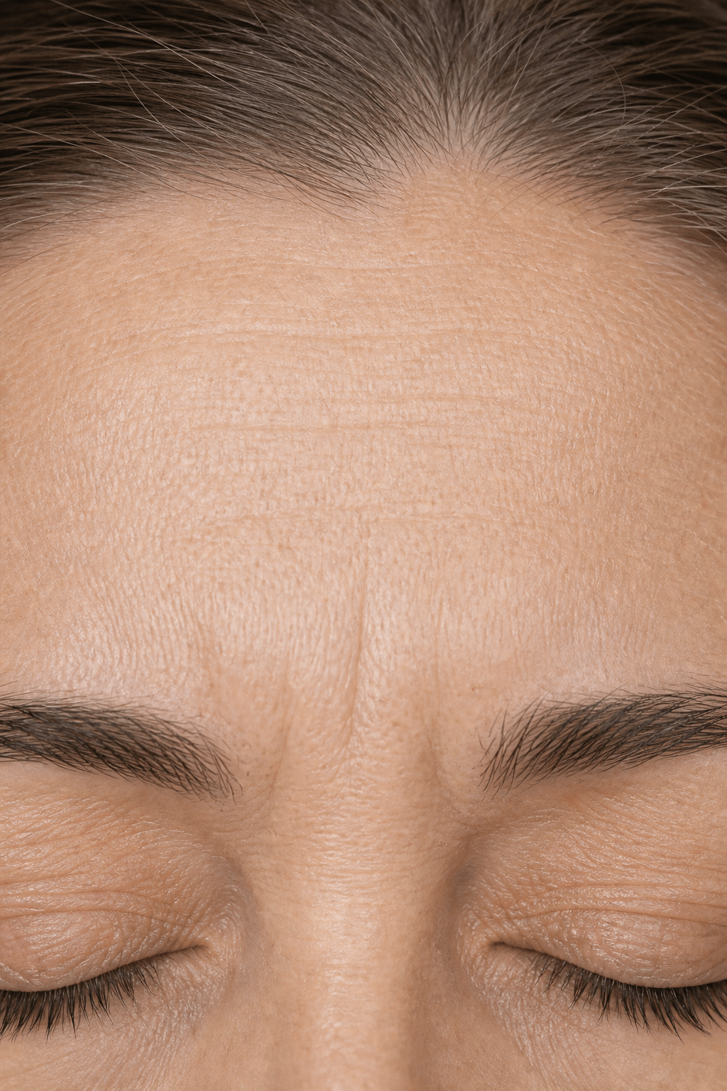 Skin detail illustrating fine lines and collagen-focused renewal care